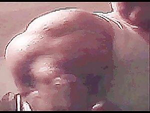 Massive Biceps in Undershirt