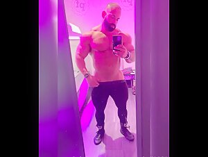 Sam Cunado IFBB bodybuilder flexing