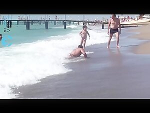 Bodybuilder Show-Off at the Beach