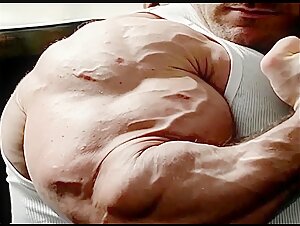 Massive Biceps in Undershirt