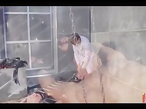Russian bodybuilder is stretched on the rack